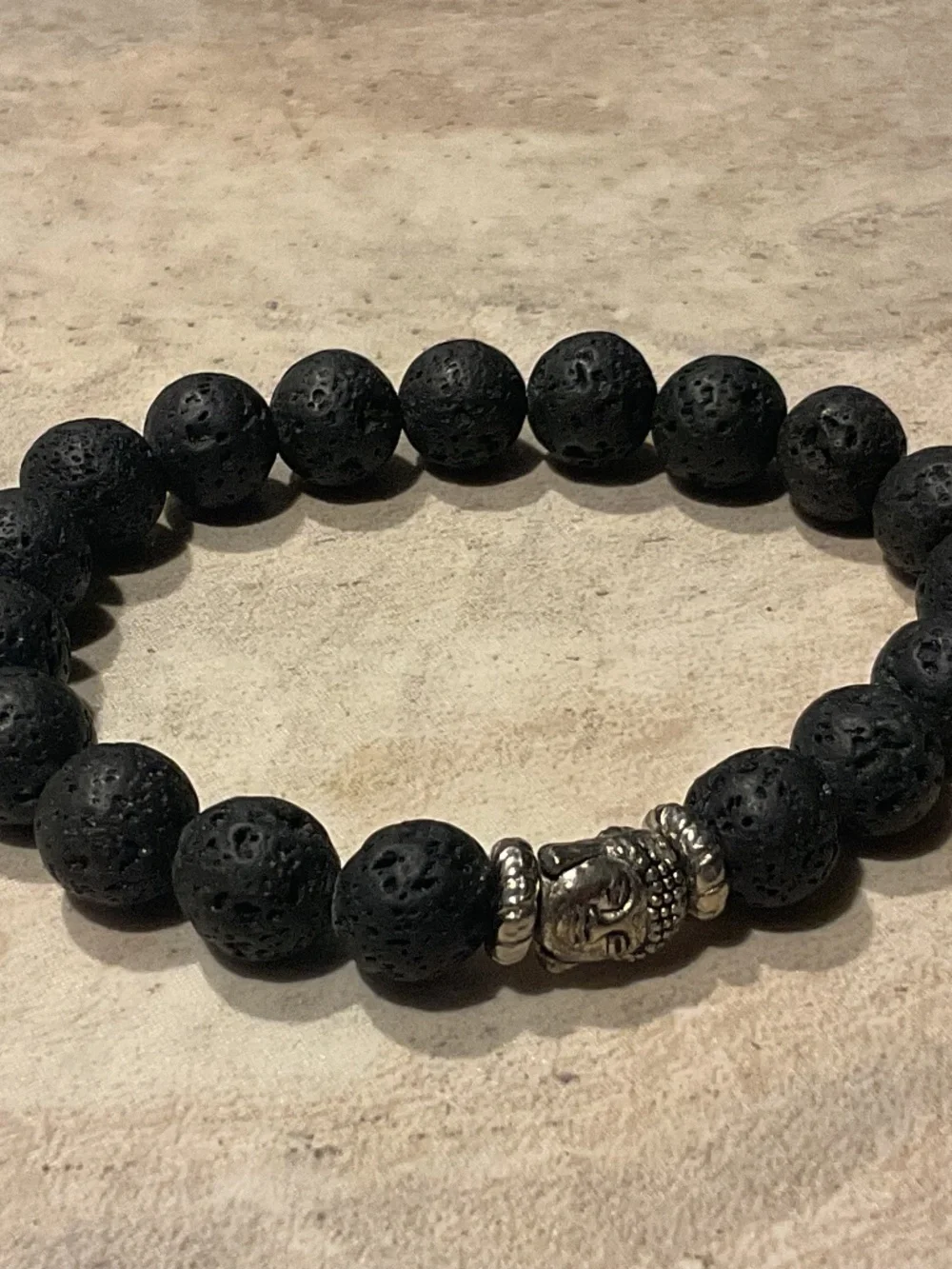 Black Lava Bead Stretch Bracelet with Silver Buddha Accent